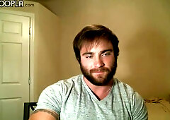 Bearded bear named James showing his muscular booty