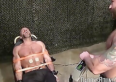 Hot military guy Dirk Caber loves being tied up to a table and tormented