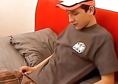 Young man pulls his dick out and masturbates with toys