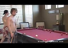 Nude mates play in billiard
