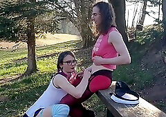 Kathi sucks Vanessas cock and gets spanked afterwards outdoor