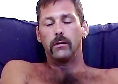 Hairy and nicely built, this guy is a sucker for a thick, dripping cock