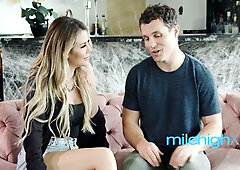 Blonde MILF rides young stud on pink sofa in luxurious modern kitchen