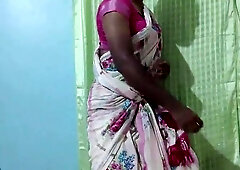 Unwrapping white flower patterned saree weared by stepsis