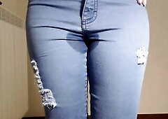 Pee in taut jeans