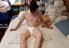 Diaper boy pees thick diaper