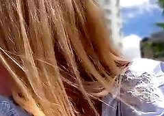 Blonde Babe Flirts in City Park