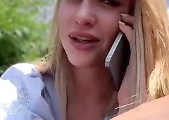 Blonde Babe Flirts in City Park