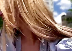 Blonde Babe Flirts in City Park