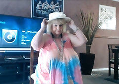 This granny has got a real filthy look and she's got huge saggy breasts