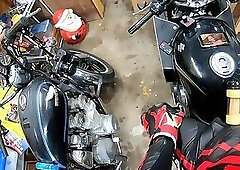 Leather Biker Stud Using A Powered Masturbator