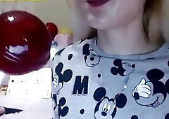 Kinky shemale slobbers on a huge dildo before riding it