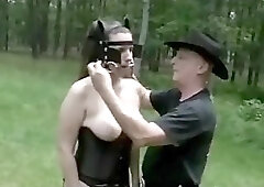 Submissive ponygirl outdoor