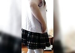 Sissy Aleksa lifts her plaid petticoat and jerks her little shlong to climax