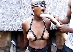 Sexy and hairless black German playgirl gets fastened up in the ebony village and gets spanked hard previous to getting her vagina screwed hard and co