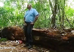 Bus conductor screws lad passenger in the forest.
