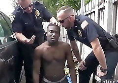 Two White Cops Having Their Way With A Black Perp