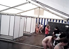 The camera follows the woman in the shower