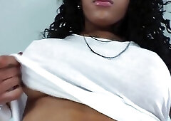 Cute ebony shemale enjoys masturbation until she cums all over