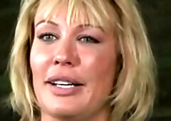 Blonde milf with a fat ass gets a rough fuck by two guys in a dungeon