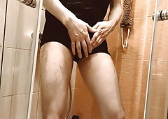 The man dances in the bathroom to the music