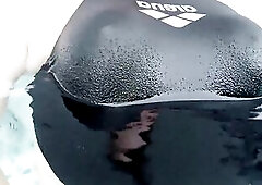 Transsexual wearing hot swimsuit and swimming in jacuzzi.