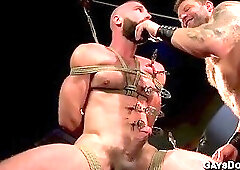 Colby Jansen and Donnie Argento Intense Leather Dungeon Rope Suspension Blowjob