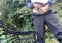 Amateur Slimb8r enjoys some public stroking on a park bench