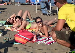 Spanish chicks seduced on a beach