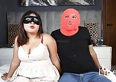 Cuckold blindfolds his wife and makes her suck 2 strangers' knobs.