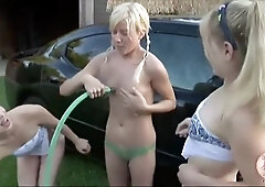 Texas Twins had a car wash and got wet and undressed