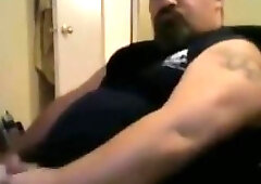 Chunky bbm plays with his dick