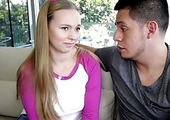 A fun loving blonde is getting held on her hips while fucked