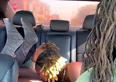 Sweet lesbian ebony cuties are having fun in the backseat.