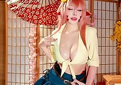 Asian temptress in costume shows off fabulous tits and ass