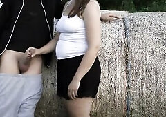 Farmer hotty gives the farmer a tugjob by his hay bales