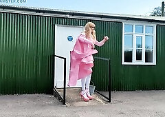 Crossdressing transsexual Gina in pink pvc jerking her dong and cumming outdoors