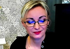 German MILF flashes cleavage on webcam