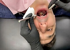 Nurse Bunny greets Canada previous to gloving up for his dental exam. That babe asks him how lengthy it's been since his final appointment and is