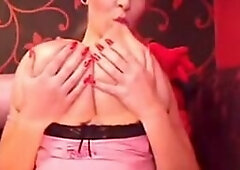 Big-Titted Webcam Girl Oils Up Her Massive Boobs