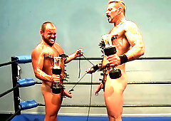 Colin Steele And Jessie Balboa Pinch Each Other With Pegs