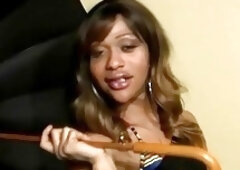 Dark skinned shemale with really big shaft strokes and cums