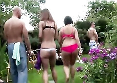 Nasty beauties are orgying in the backyard, around the swimming pool, in the midst of the day