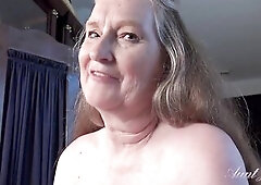 Your Busty 61yo Mature GILF Stepmom Maggie gives you a handjob and masturbates with you. Another gem from AuntJudy's famous "Mature POV Expe