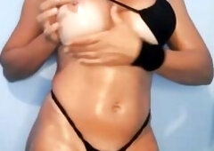 I look so sexy so keep staring at me on camera with so much craving as I begin rubbing oil all over my body.