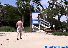 Dicksucking jock lifeguard fucked on beach