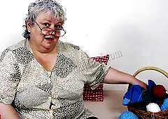 Chubby old BBW Majka shows off her shaved pussy and her toy