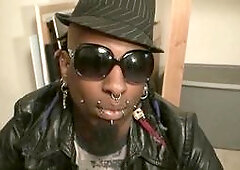 Tattooed Penny empties huge cock during job interview