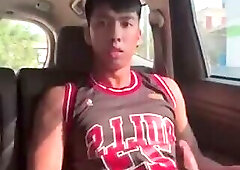 Thai guy jerks off in the car