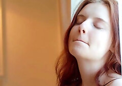 Sweet redhead chick Sienna is having fun with her hungry wet snatch